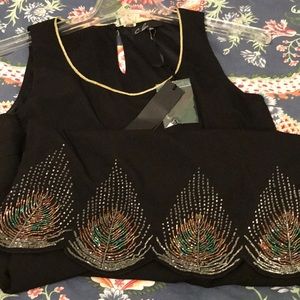 C. Luce dress peacock dress small beaded